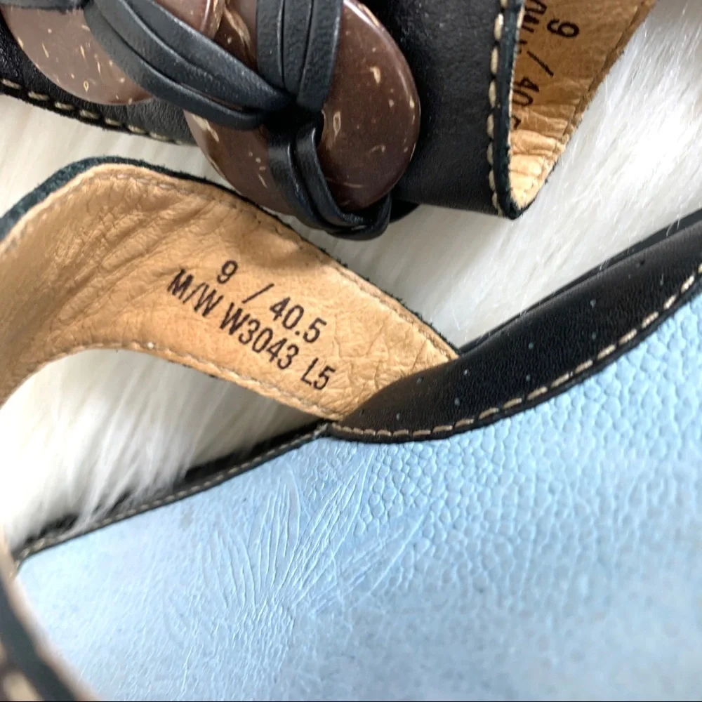 Born black thong sandals disc trim